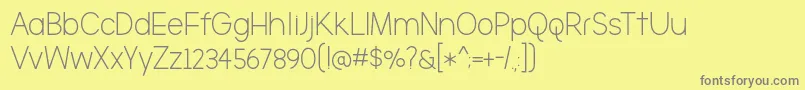 フォントTheBrooklyn – 黄色の背景に灰色の文字
