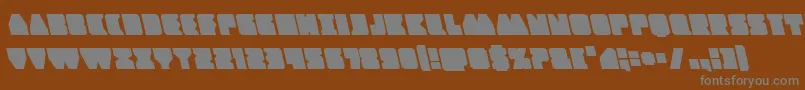 Contourofdutyleft-fontti – harmaat kirjasimet ruskealla taustalla