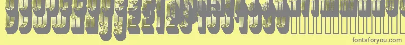 フォントDisco3 – 黄色の背景に灰色の文字