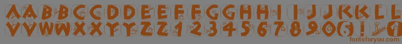 Classicapsxmas-Schriftart – Braune Schriften auf grauem Hintergrund