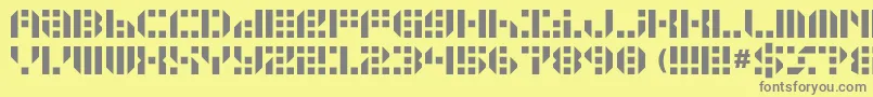 Gunju-fontti – harmaat kirjasimet keltaisella taustalla