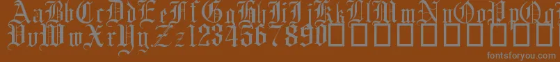 EnglishGothic17thC-Schriftart – Graue Schriften auf braunem Hintergrund