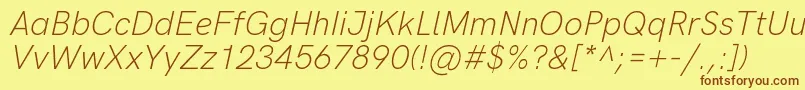 フォントHkgroteskLightitalic – 茶色の文字が黄色の背景にあります。