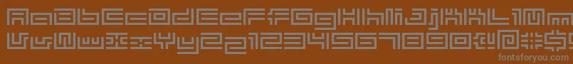 Bmtube-fontti – harmaat kirjasimet ruskealla taustalla
