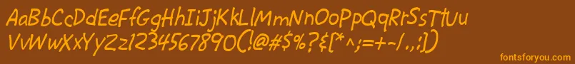 フォントCacKrazyLegs – オレンジ色の文字が茶色の背景にあります。