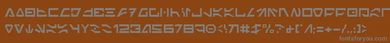 ImperialCode2-fontti – harmaat kirjasimet ruskealla taustalla