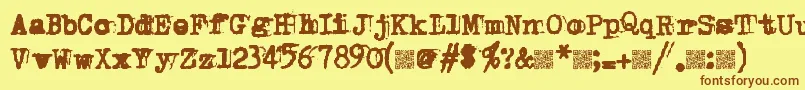 フォントDoubleStudio – 茶色の文字が黄色の背景にあります。