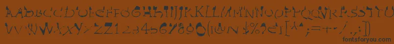 フォントInvasionLtWilhelm – 黒い文字が茶色の背景にあります