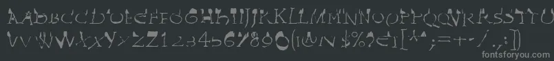 フォントInvasionLtWilhelm – 黒い背景に灰色の文字