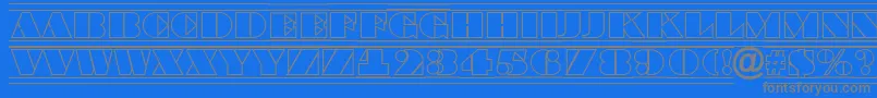 フォントBraggatitulotldcfrRegular – 青い背景に灰色の文字