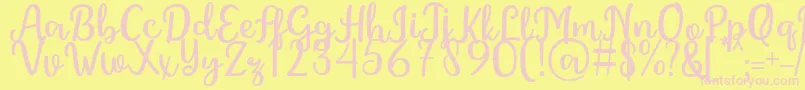 GintaFont Font – Pink Fonts on Yellow Background