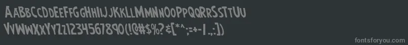 フォントEarthsmightiestleft – 黒い背景に灰色の文字