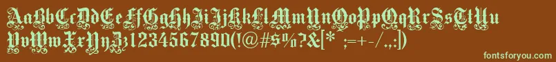 フォントVictoriantext – 緑色の文字が茶色の背景にあります。