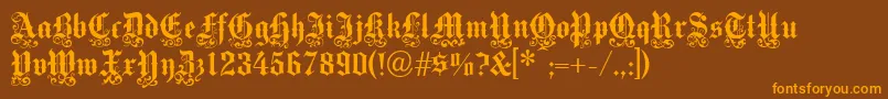 fuente Victoriantext – Fuentes Naranjas Sobre Fondo Marrón