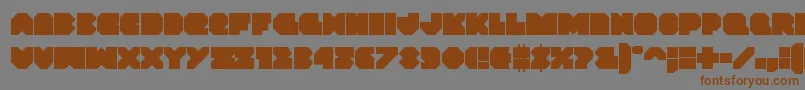 フォントVxrocket – 茶色の文字が灰色の背景にあります。