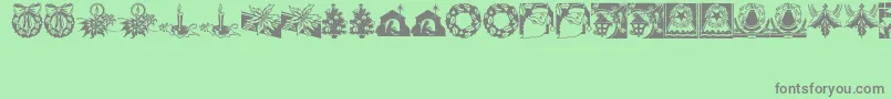 CobbShinnChristmasCuts Font – Gray Fonts on Green Background