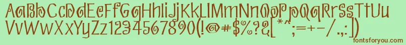 Eskargot Font – Brown Fonts on Green Background