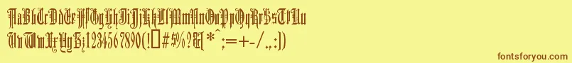 Шрифт Duerergotisch – коричневые шрифты на жёлтом фоне