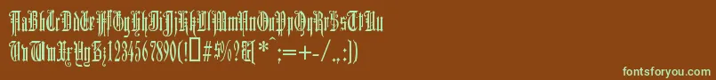 フォントDuerergotisch – 緑色の文字が茶色の背景にあります。