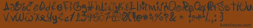 Шрифт Letraslocas2 – чёрные шрифты на коричневом фоне