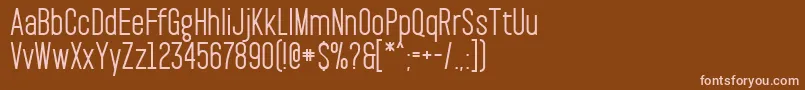 PaktSemibold-fontti – vaaleanpunaiset fontit ruskealla taustalla