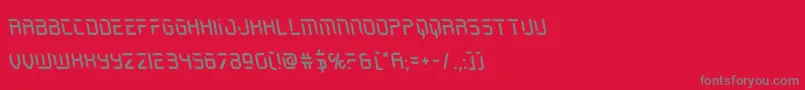 フォントHolojacketleft – 赤い背景に灰色の文字