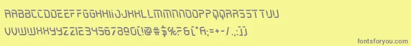 フォントHolojacketleft – 黄色の背景に灰色の文字