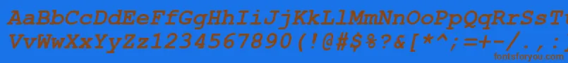 Axccrtbi Font – Brown Fonts on Blue Background