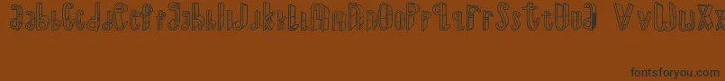 TheSuperRyal2015-Schriftart – Schwarze Schriften auf braunem Hintergrund