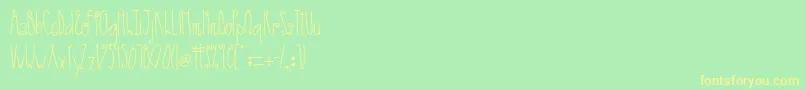 AustieBostSmallWorld Font – Yellow Fonts on Green Background