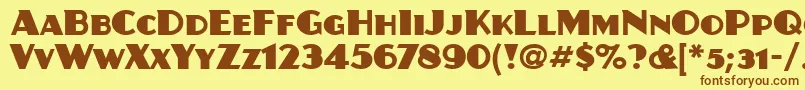 フォントJuanitaItc – 茶色の文字が黄色の背景にあります。