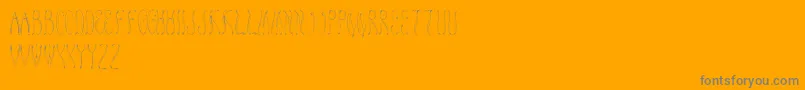 Honey ffy-Schriftart – Graue Schriften auf orangefarbenem Hintergrund