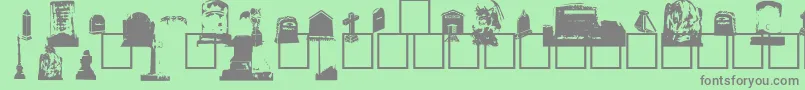GravestoneBats-Schriftart – Graue Schriften auf grünem Hintergrund