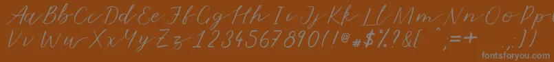 Marmalade Font – Gray Fonts on Brown Background
