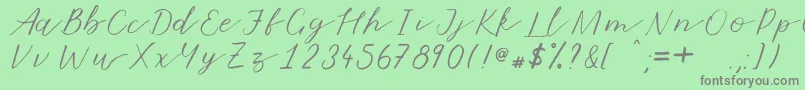 Marmalade Font – Gray Fonts on Green Background