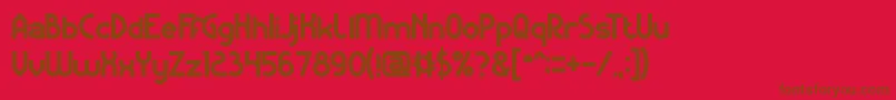 フォントKangarooPunchBold – 赤い背景に茶色の文字