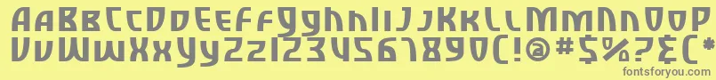 SfRetroesqueSc-fontti – harmaat kirjasimet keltaisella taustalla
