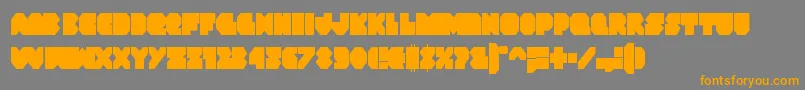 フォントVxrocketcond – オレンジの文字は灰色の背景にあります。