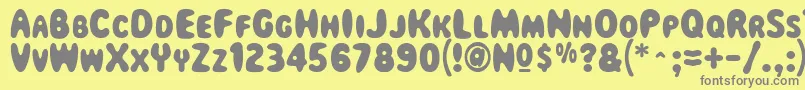 Magicalmysterytour-Schriftart – Graue Schriften auf gelbem Hintergrund