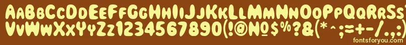 Magicalmysterytour Font – Yellow Fonts on Brown Background