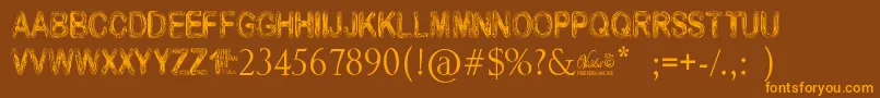 フォントVidkaWoodcraft – オレンジ色の文字が茶色の背景にあります。