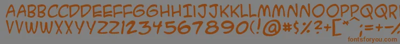 Acmesa-Schriftart – Braune Schriften auf grauem Hintergrund