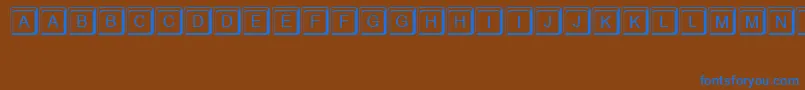 Keystroke Font – Blue Fonts on Brown Background