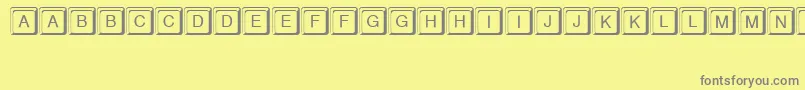 Czcionka Keystroke – szare czcionki na żółtym tle
