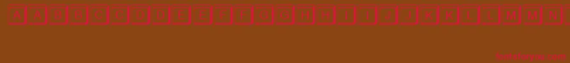 Keystroke Font – Red Fonts on Brown Background