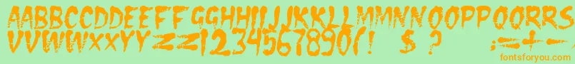 フォントDseraserc – オレンジの文字が緑の背景にあります。