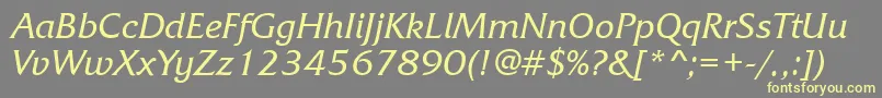 FrizquadratabttItalic-fontti – keltaiset fontit harmaalla taustalla