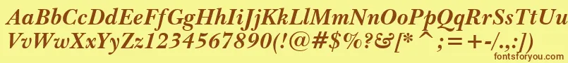 BaskervilleWin95btBoldItalic-Schriftart – Braune Schriften auf gelbem Hintergrund