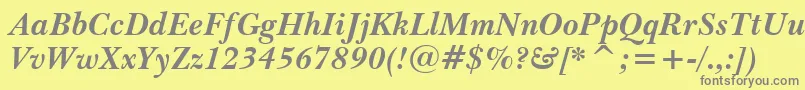 フォントBaskervilleWin95btBoldItalic – 黄色の背景に灰色の文字