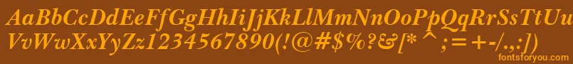 Czcionka BaskervilleWin95btBoldItalic – pomarańczowe czcionki na brązowym tle